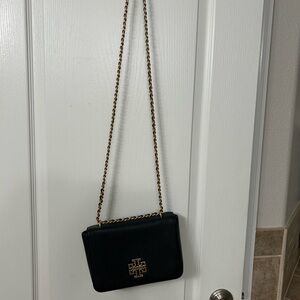 Tory Burch dressy black and gold shoulder bag